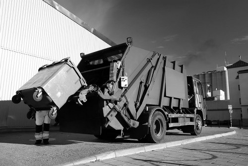 Construction site with builders waste being cleared in Ruislip