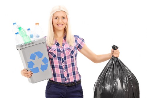 Workers sorting recyclables during a home clearance in Ruislip